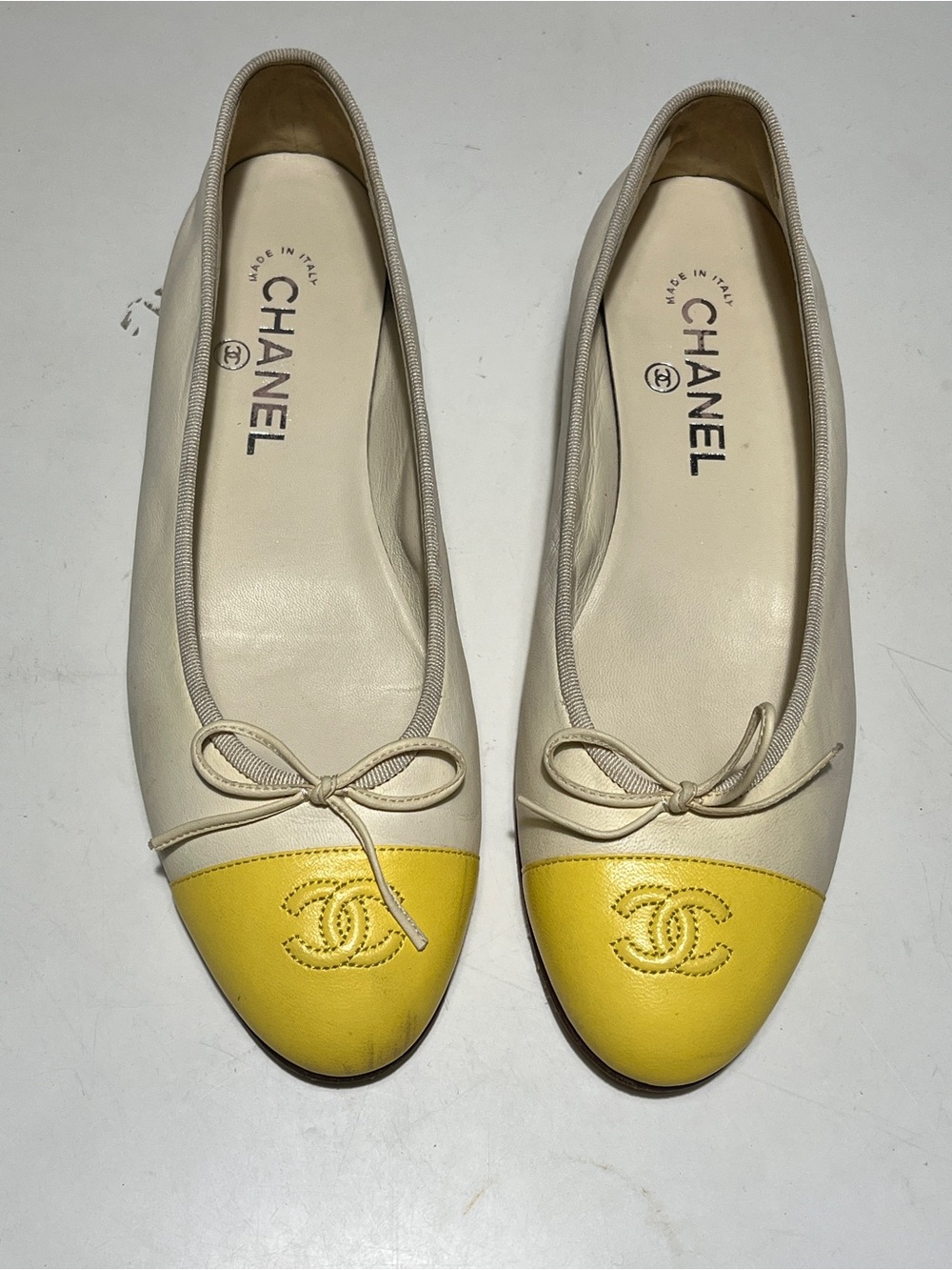 CHANEL Cream Leather Ballet Flats with Yellow Cap Toe